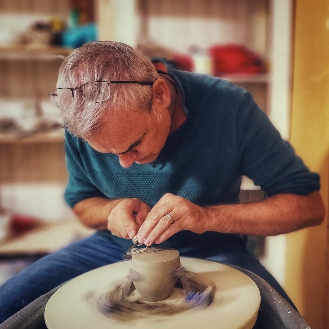 David Stubley working at the pottery wheel